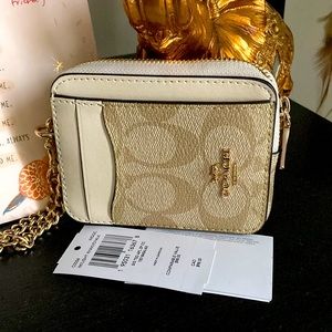 Coach small card wallet.